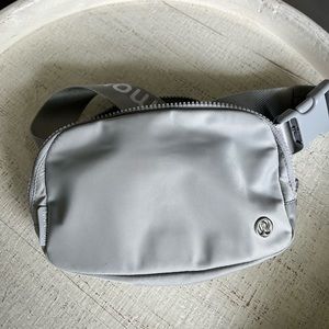Lululemon belt bag in the color silver drop/white.